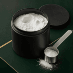 Premium creatine monohydrate powder with scoop